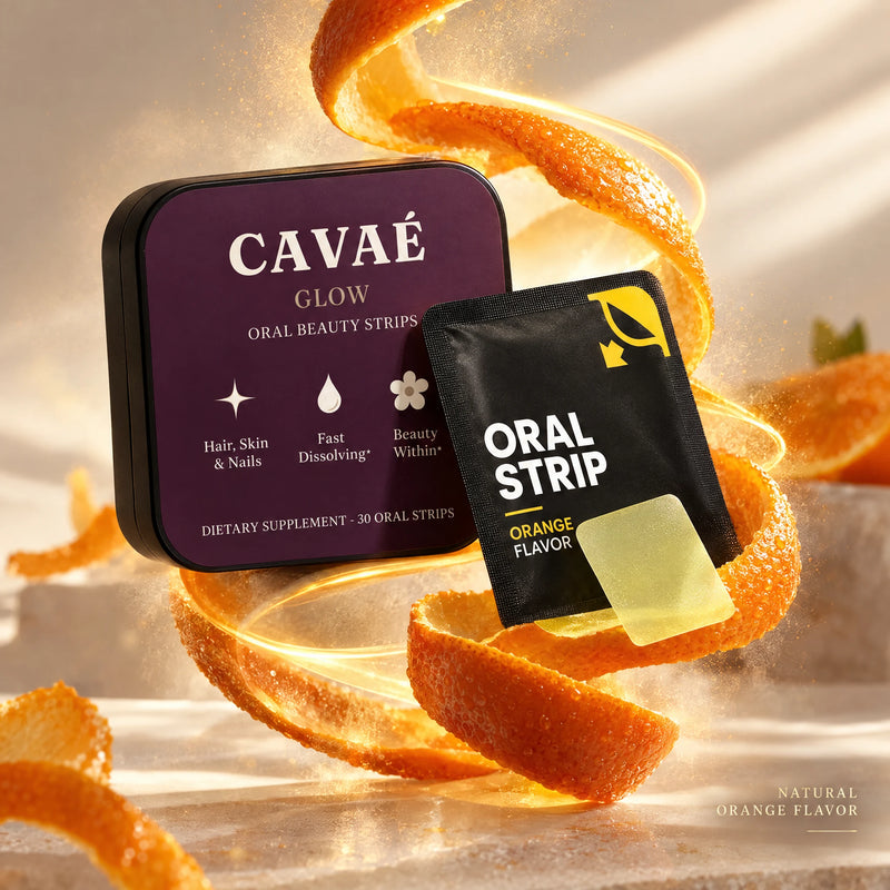 CAVAÉ GLOW tin and orange sachets with a vibrant citrus ribbon and orange slices.